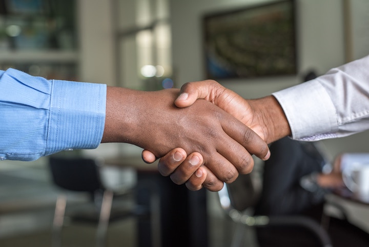 shaking hands to show company culture