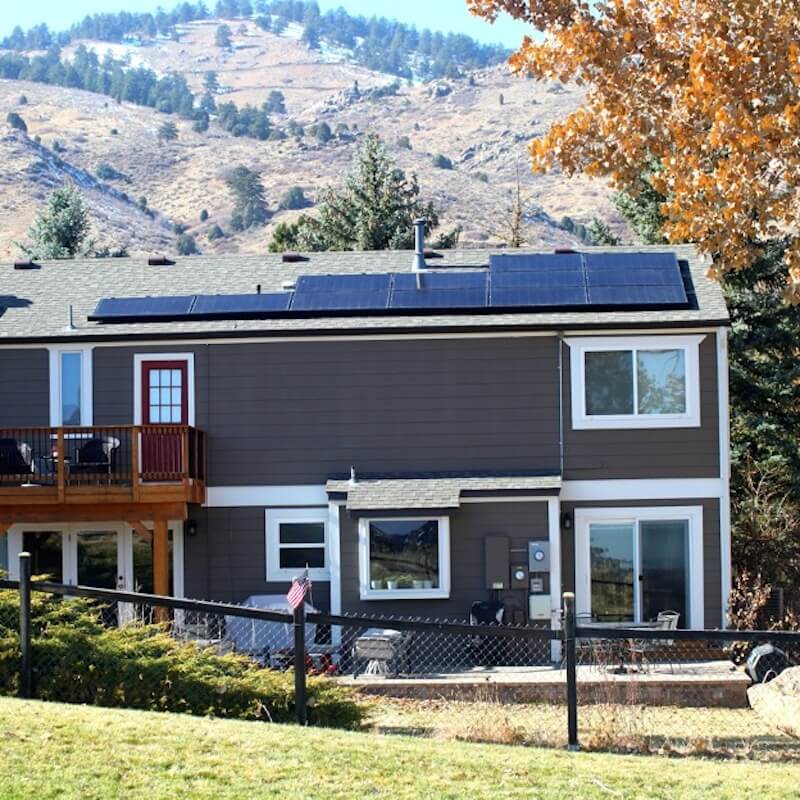 residential solar panels on brown house