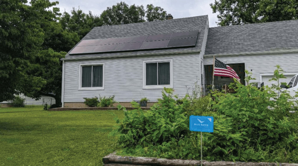 Blue Raven Solar 10-panel installation with blue yard sign