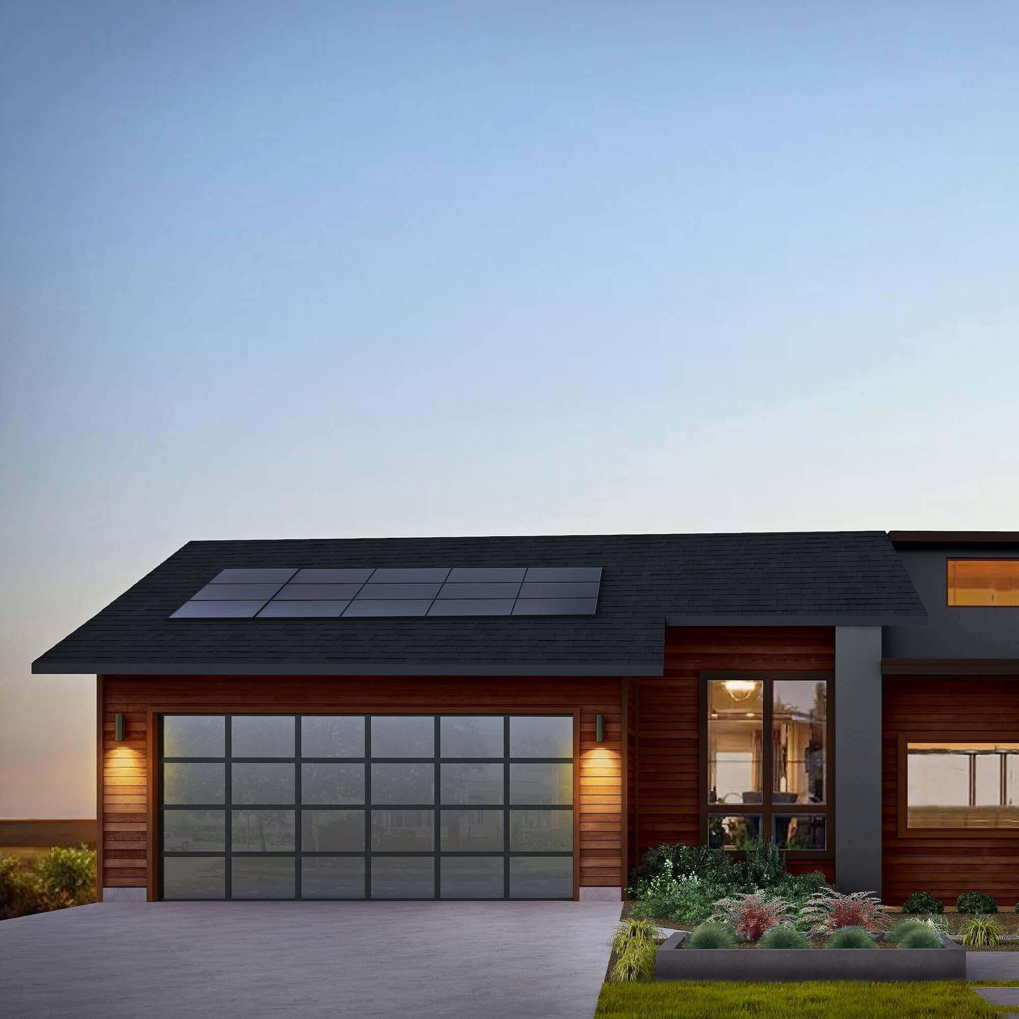 One level home with glass grid-garage door, solar panels, and dark-toned exterior