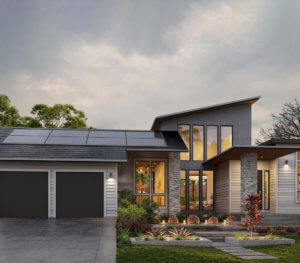 Grey toned house with large windows, solar panels, and modern architecture