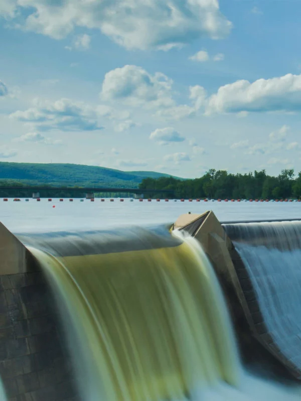 Hydropower representation through wall of dam reservoir