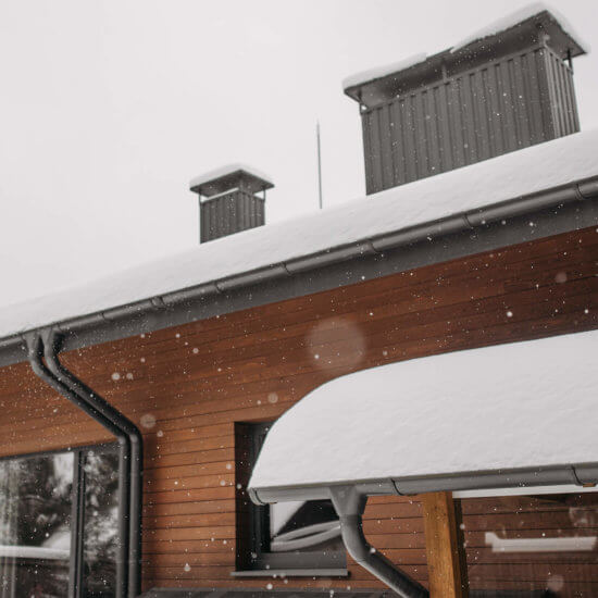 Roofline with large amounts of snowfall piled up