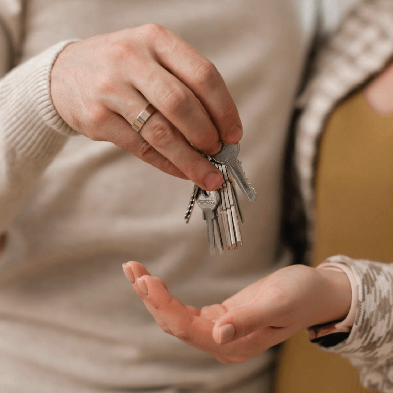 Transferring of house keys between two hands