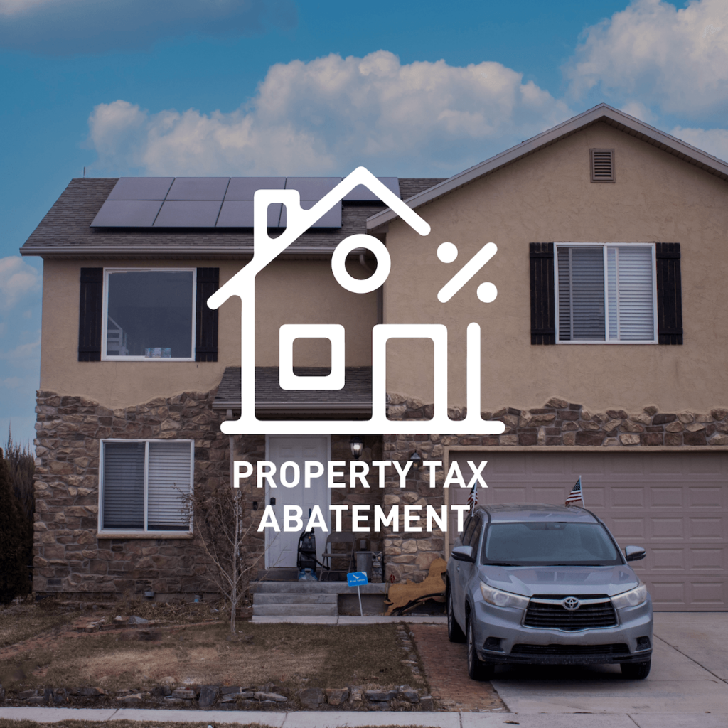 'Property Tax Abatement' text and house icon overlaid on two-story home, installed by Blue Raven Solar