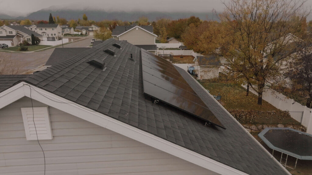 Roof angle view of an 8 panel system installed on the back of a home