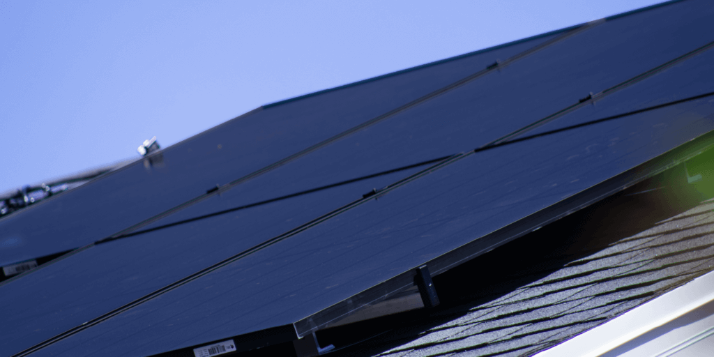 What is a Solar Power Production Guarantee-03 Up close shot of a 6-panel solar system installed on a home